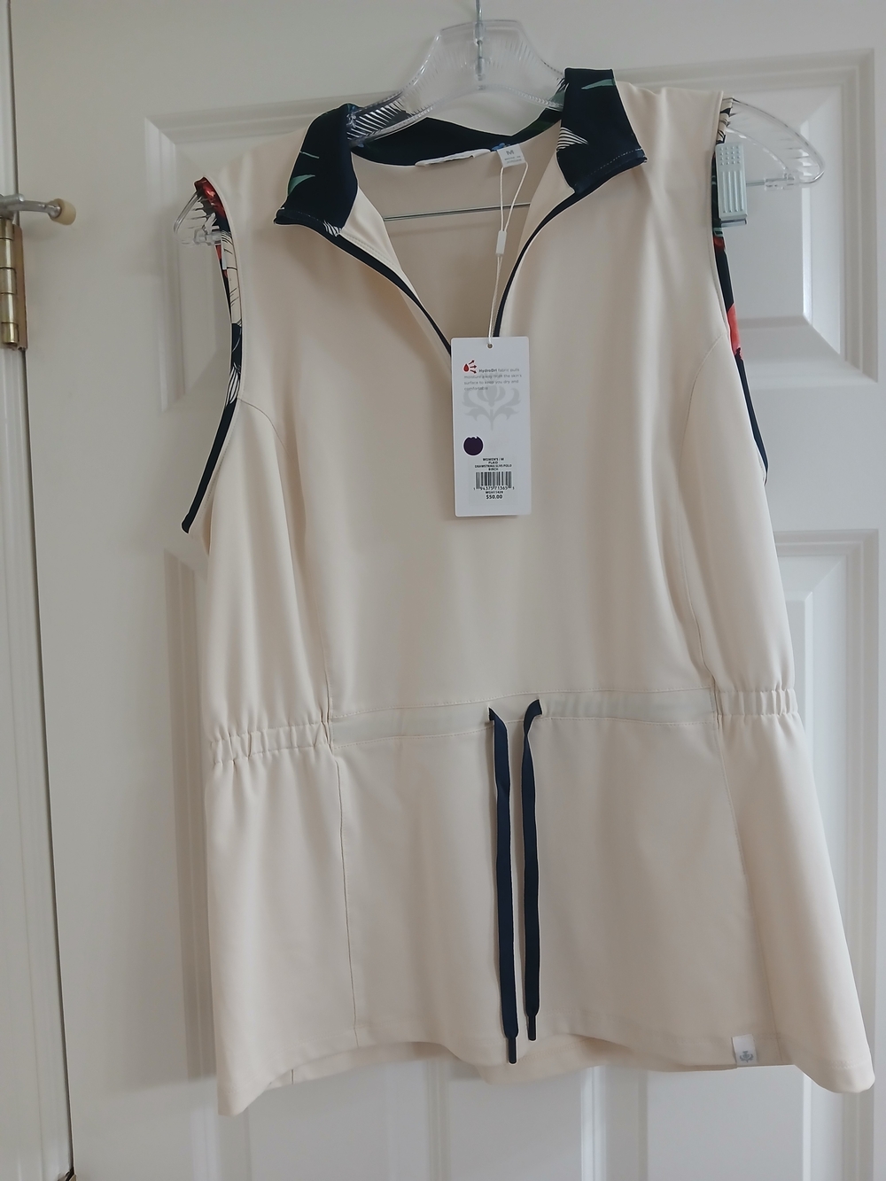 Lady Hagen Cream Sleeveless Drawstring Golf Romper Top with Navy Trim